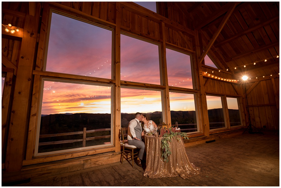 Granite Ridge Estate & Barn Wedding bride at reception bride and groom at reception during sunset