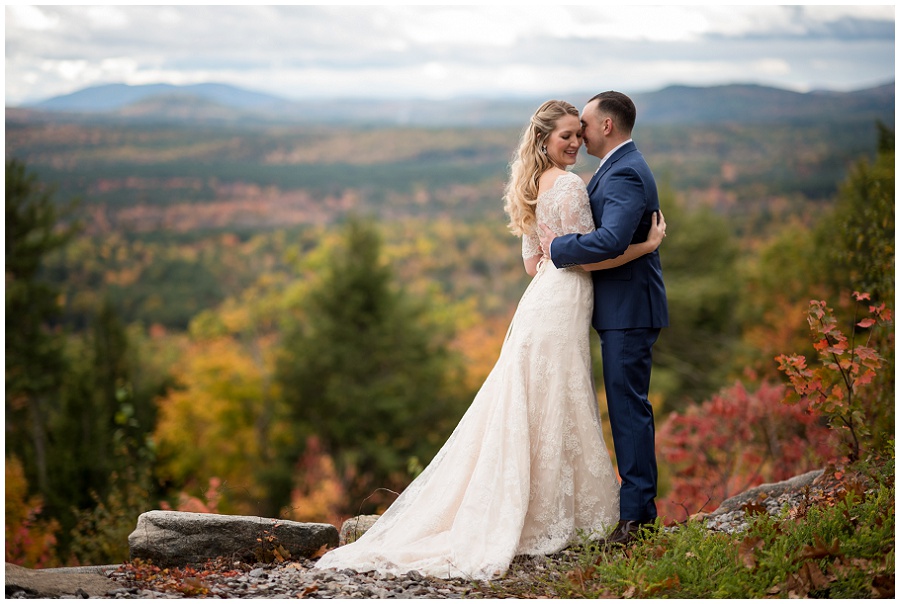 Couples portraits of the bride and groom with fall foliage at Granite Ridge Estate and Barn in Norway Maine