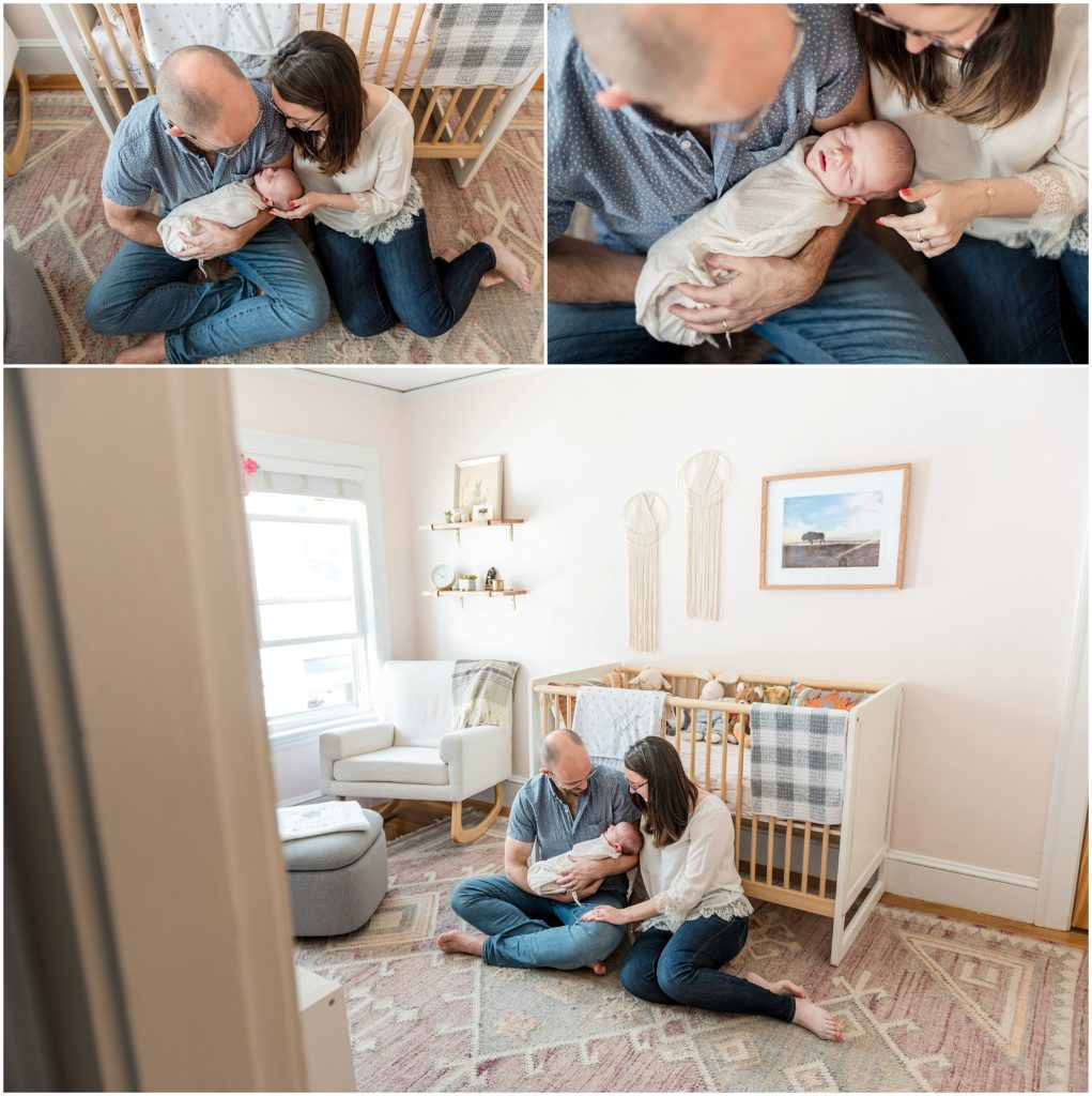 Parents holding newborn in nursery